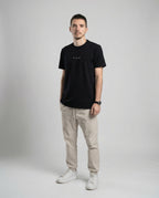 DIBON men’s black t-shirt photographed from an angle, modern and luxurious look