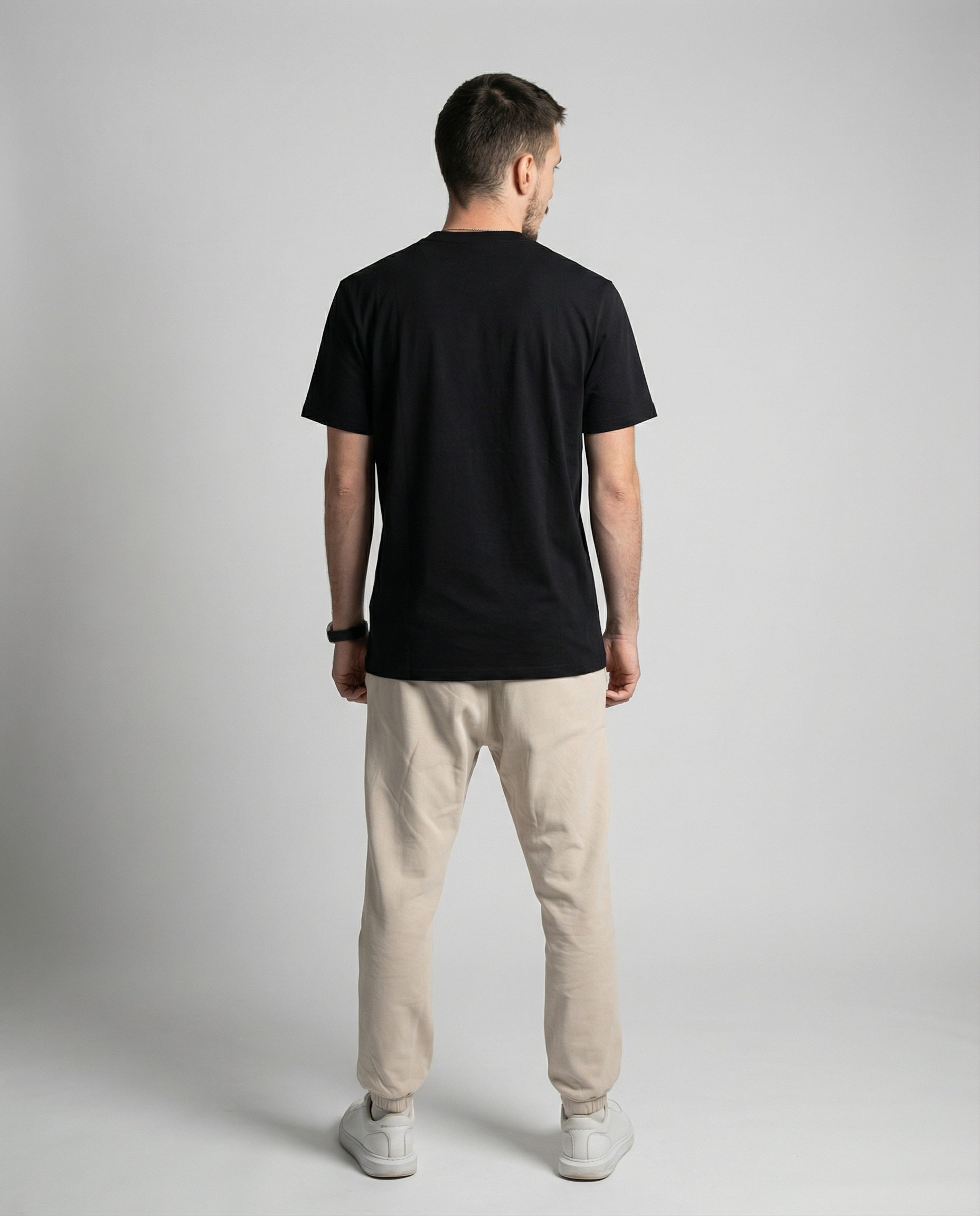 DIBON men’s black t-shirt with elegant fit, back view showcasing the clean silhouette