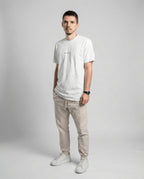 DIBON men’s white t-shirt captured from an angled perspective, sophisticated style